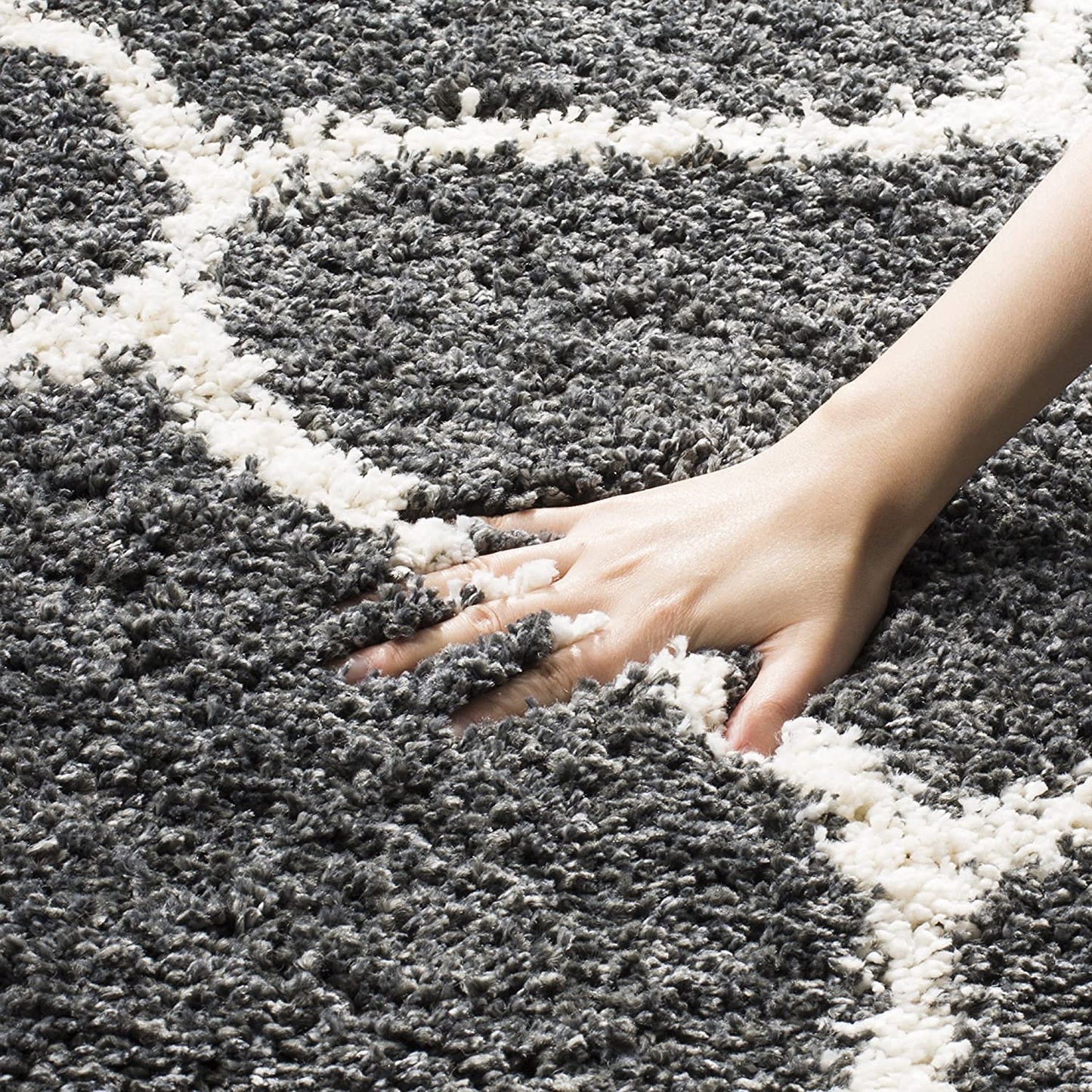 Micro Moroccan Lattice Carpet In Dark Grey And ivory.